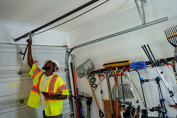 Professional Garage Door Panel Replacement technician working in Elk Mound, WI